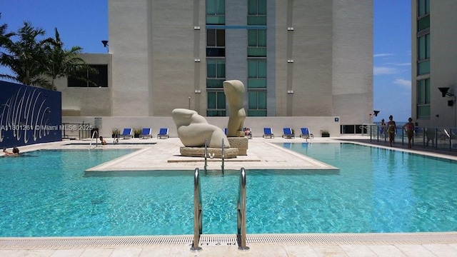 335 S Biscayne Bl Unit 902, Miami, FL 33131 - community pool with a patio and fence