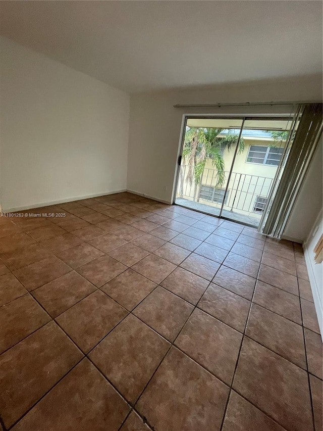 7841 Dunham Blvd Unit 6, Miami, FL 33138 - unfurnished room with tile patterned flooring and baseboards
