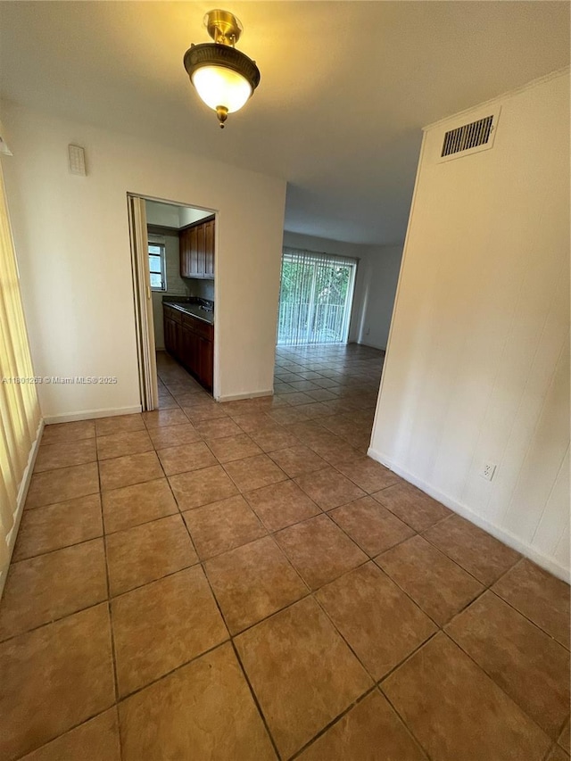 7841 Dunham Blvd Unit 6, Miami, FL 33138 - tiled spare room with baseboards