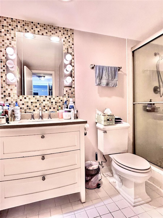 600 Three Islands Blvd Unit 905, Hallandale Beach, FL 33009 - bathroom with a shower stall, tile patterned flooring, toilet, vanity, and backsplash