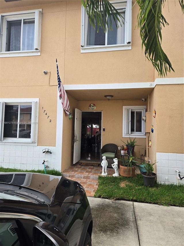 17472 SW 140th Ct, Miami, FL 33177 - entrance to property featuring stucco siding
