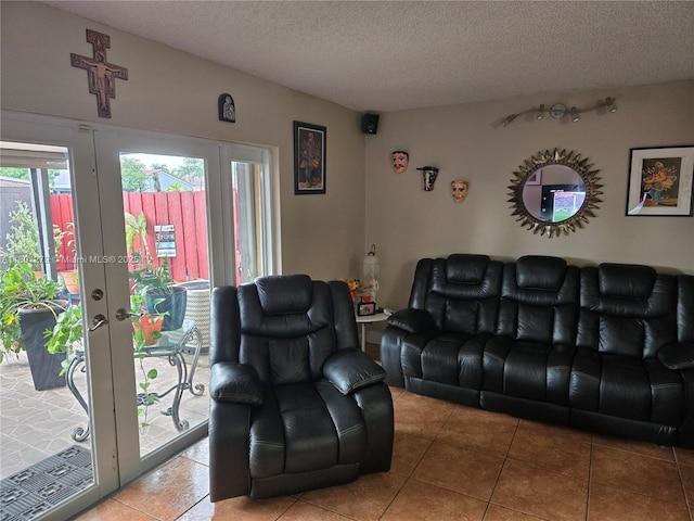 17472 SW 140th Ct, Miami, FL 33177 - tiled living room featuring a textured ceiling and french doors