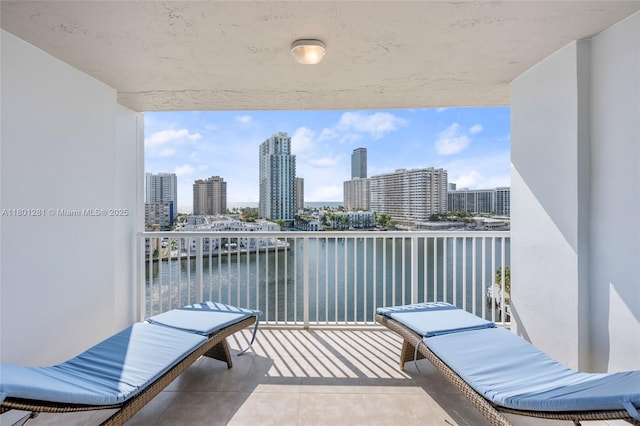 121 Golden Isles Dr Unit 905, Hallandale Beach, FL 33009 - balcony featuring a view of skyline and a water view