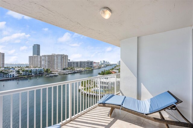 121 Golden Isles Dr Unit 905, Hallandale Beach, FL 33009 - balcony with a water view and a view of city