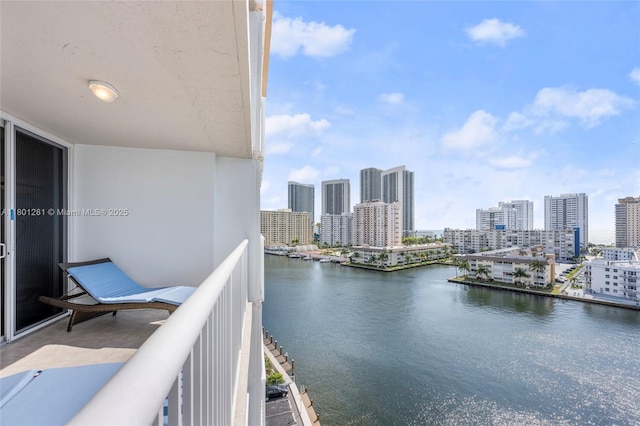 121 Golden Isles Dr Unit 905, Hallandale Beach, FL 33009 - balcony featuring a water view and a skyline view