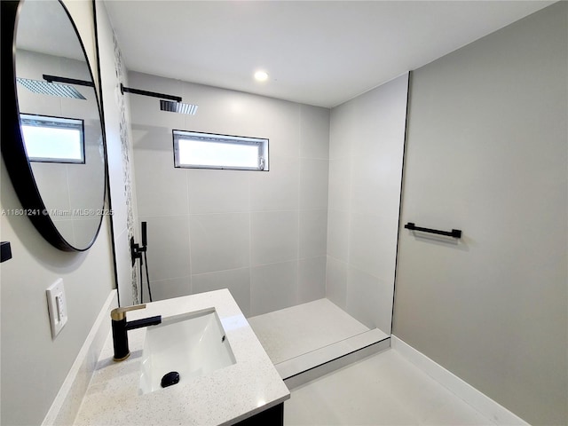 4230 NW 52nd Ave, Lauderdale Lakes, FL 33319 - bathroom with vanity, walk in shower, baseboards, and recessed lighting