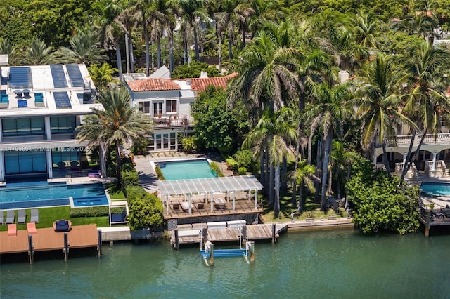 5215 Pine Tree Dr, Miami Beach, FL 33140 - drone / aerial view of a large body of water and a pool area
