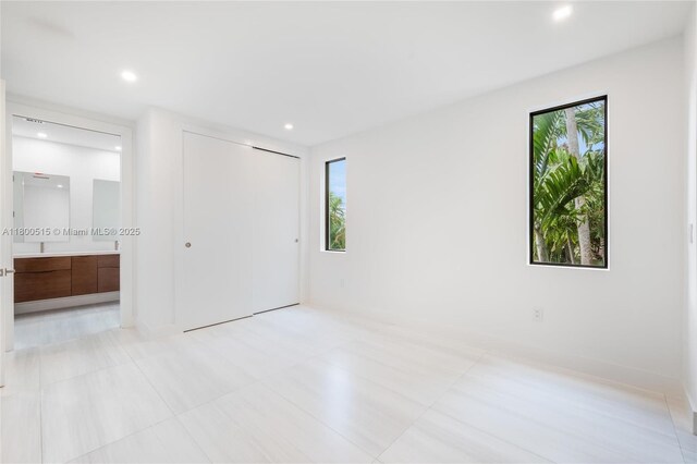 3637 SW 3rd Ave Right, Unit Right, Miami, FL 33145 - unfurnished bedroom featuring ensuite bath, recessed lighting, and a closet