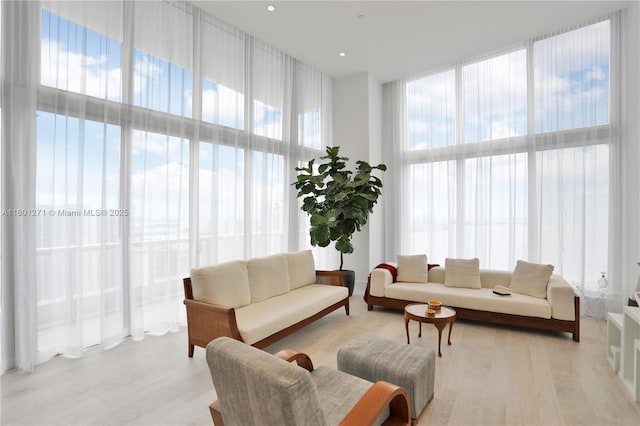 495 Brickell Ave Unit 4102, Miami, FL 33131 - living area with light wood-style flooring and a high ceiling
