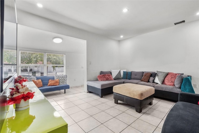 621 E 8th St, Hialeah, FL 33010 - living area featuring light tile patterned floors and recessed lighting