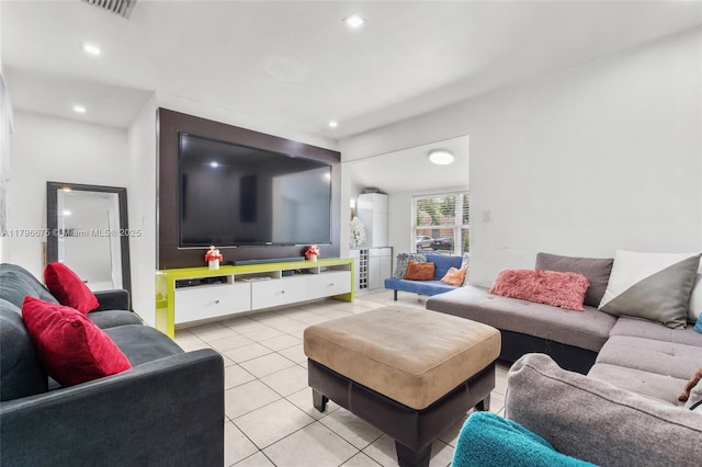 621 E 8th St, Hialeah, FL 33010 - living room featuring light tile patterned flooring and recessed lighting