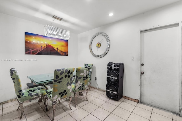 621 E 8th St, Hialeah, FL 33010 - tiled dining room featuring a chandelier and recessed lighting