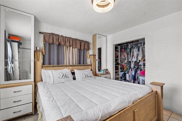621 E 8th St, Hialeah, FL 33010 - bedroom with a closet and light tile patterned floors