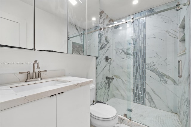 621 E 8th St, Hialeah, FL 33010 - bathroom featuring vanity, a marble finish shower, and recessed lighting