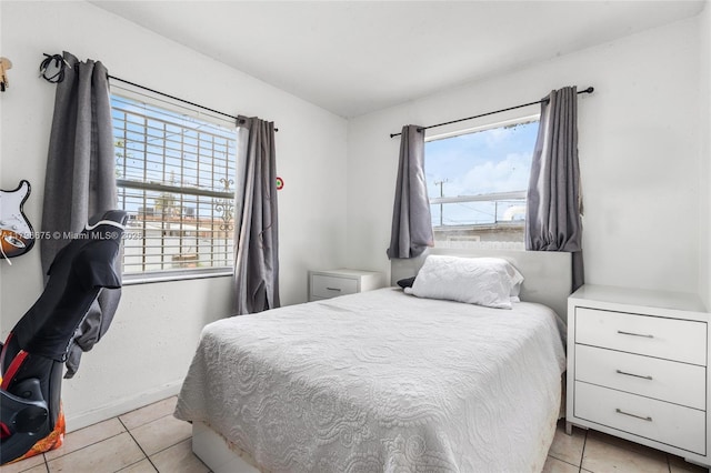 621 E 8th St, Hialeah, FL 33010 - bedroom featuring light tile patterned floors