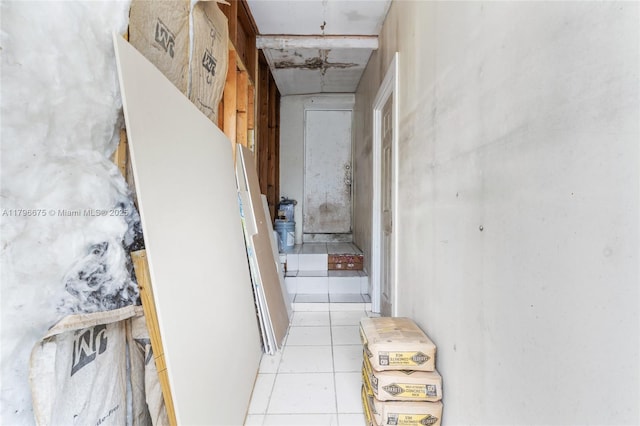621 E 8th St, Hialeah, FL 33010 - corridor featuring light tile patterned floors