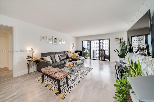 1201 S Ocean Dr Unit 1105N, Hollywood, FL 33019 - living area featuring baseboards