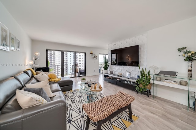 1201 S Ocean Dr Unit 1105N, Hollywood, FL 33019 - living room featuring baseboards