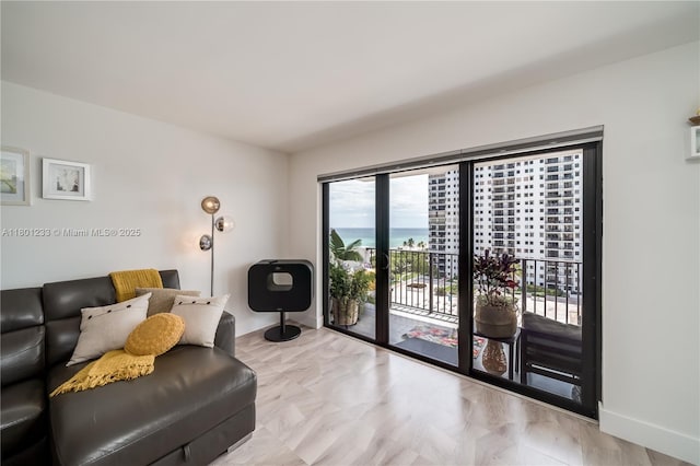 1201 S Ocean Dr Unit 1105N, Hollywood, FL 33019 - living room featuring baseboards