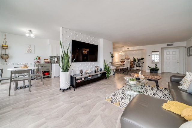 1201 S Ocean Dr Unit 1105N, Hollywood, FL 33019 - living room with a chandelier