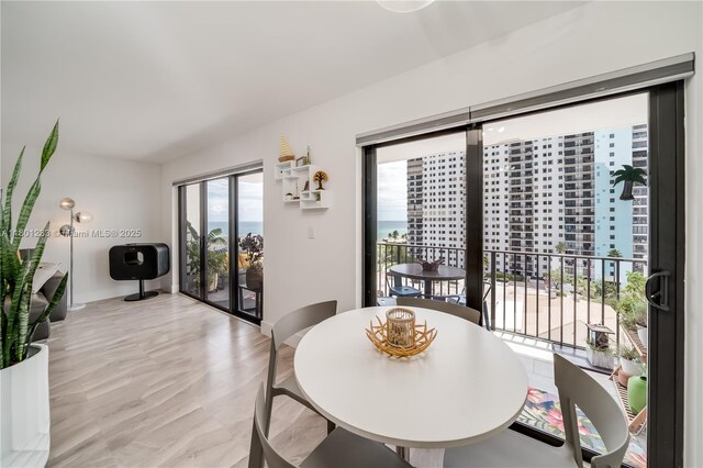 1201 S Ocean Dr Unit 1105N, Hollywood, FL 33019 - dining room featuring baseboards