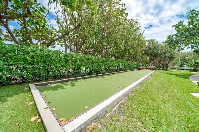 1201 S Ocean Dr Unit 1105N, Hollywood, FL 33019 - view of community with a bocce ball area and a yard