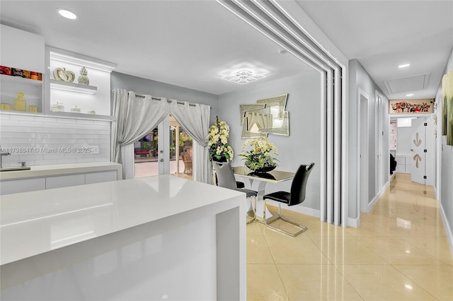 7011 Raleigh St, Hollywood, FL 33024 - corridor featuring light tile patterned flooring, baseboards, and recessed lighting