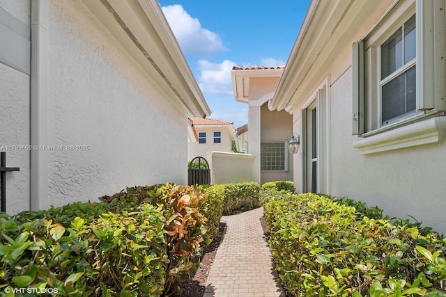 1576 Breakwater Ter, Hollywood, FL 33019 - view of exterior entry with stucco siding