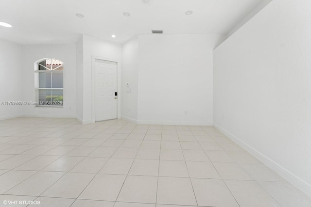 1576 Breakwater Ter, Hollywood, FL 33019 - empty room with recessed lighting and light tile patterned floors