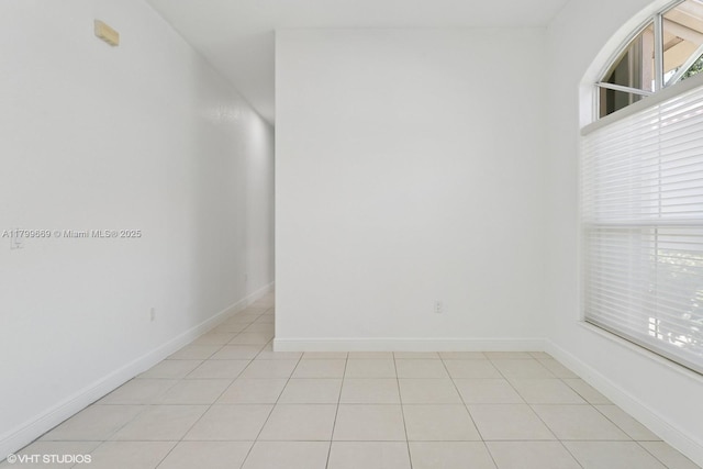 1576 Breakwater Ter, Hollywood, FL 33019 - unfurnished room with light tile patterned flooring and baseboards