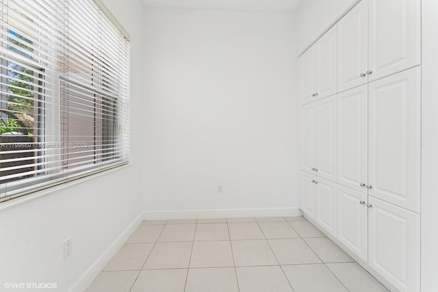 1576 Breakwater Ter, Hollywood, FL 33019 - spare room featuring baseboards and light tile patterned floors