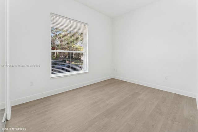 1576 Breakwater Ter, Hollywood, FL 33019 - empty room featuring light wood-style floors and baseboards