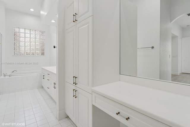 1576 Breakwater Ter, Hollywood, FL 33019 - full bath with tile patterned floors, vanity, a garden tub, and recessed lighting