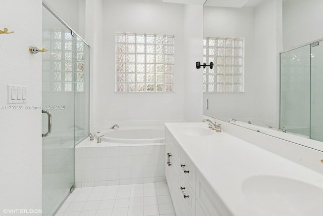 1576 Breakwater Ter, Hollywood, FL 33019 - bathroom featuring plenty of natural light, a bath, a shower stall, and double vanity