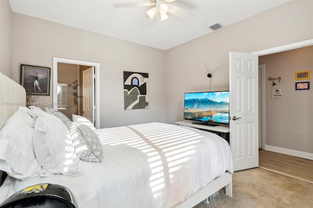 21660 Hammock Point Dr, Boca Raton, FL 33433 - bedroom with ceiling fan, baseboards, light colored carpet, and ensuite bathroom