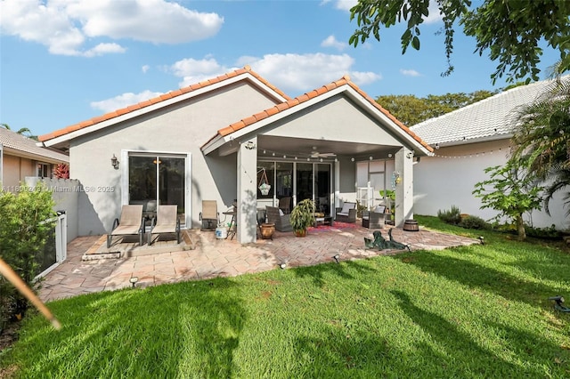 21660 Hammock Point Dr, Boca Raton, FL 33433 - rear view of property with ceiling fan, a patio, stucco siding, and a tiled roof
