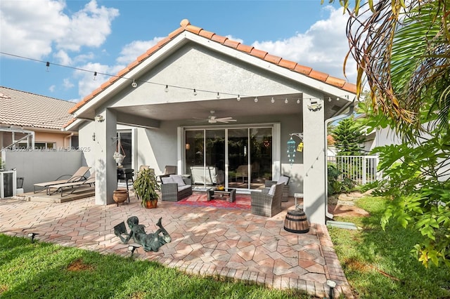 21660 Hammock Point Dr, Boca Raton, FL 33433 - back of property featuring stucco siding, ceiling fan, fence, and a patio area