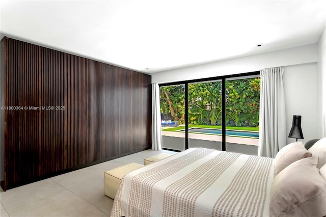 4275 Prairie Ave, Miami Beach, FL 33140 - bedroom featuring access to outside and light tile patterned floors