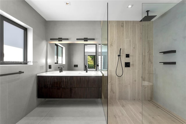 4275 Prairie Ave, Miami Beach, FL 33140 - bathroom featuring tiled shower and double vanity