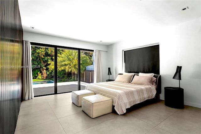 4275 Prairie Ave, Miami Beach, FL 33140 - bedroom with access to outside and baseboards