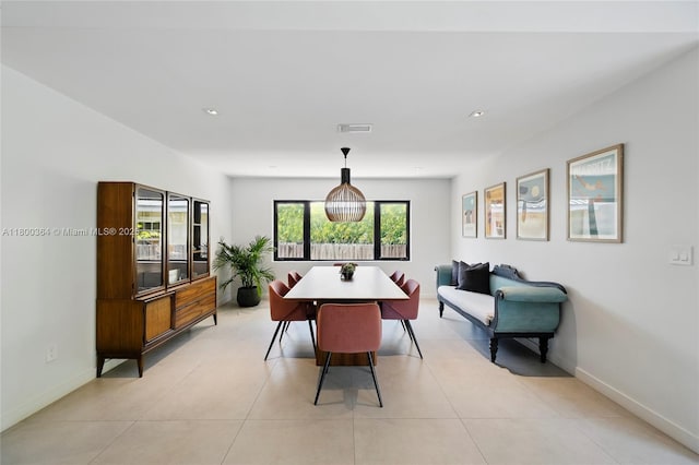 4275 Prairie Ave, Miami Beach, FL 33140 - dining area with baseboards and recessed lighting