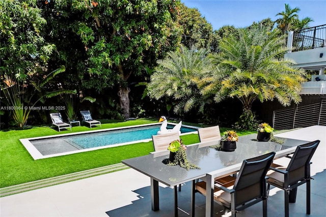 4275 Prairie Ave, Miami Beach, FL 33140 - view of swimming pool with a patio area and a yard