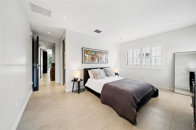 4275 Prairie Ave, Miami Beach, FL 33140 - bedroom featuring baseboards and light tile patterned floors