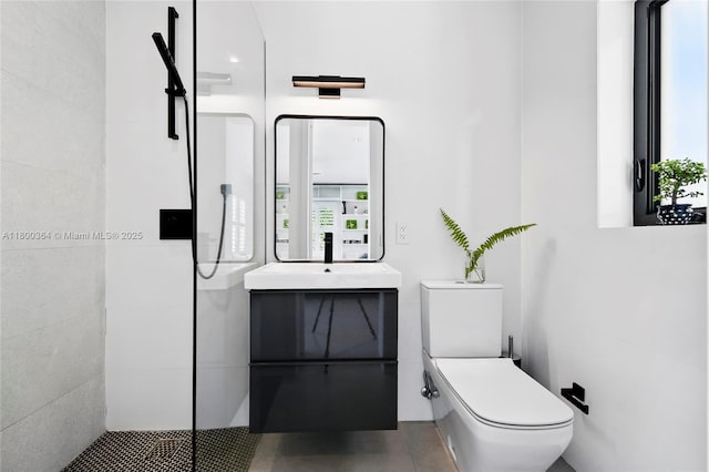 4275 Prairie Ave, Miami Beach, FL 33140 - bathroom with toilet, vanity, and tiled shower