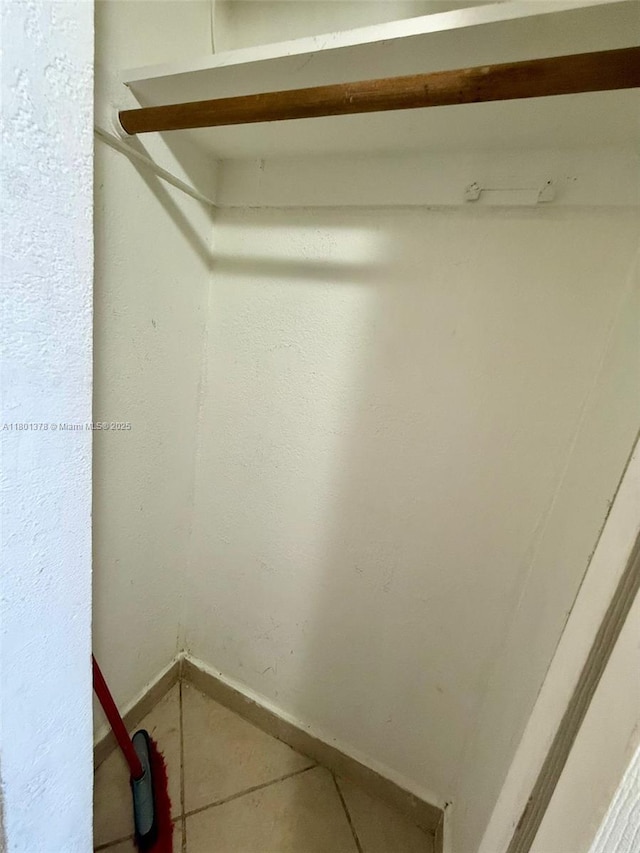19201 Collins Ave Unit 241, Sunny Isles Beach, FL 33160 - spacious closet featuring tile patterned flooring