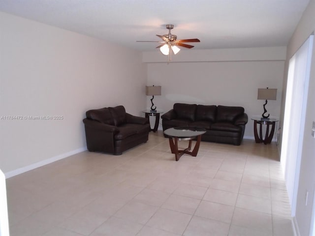 597 Green Springs Pl, West Palm Beach, FL 33409 - living area with a ceiling fan, light tile patterned floors, and baseboards