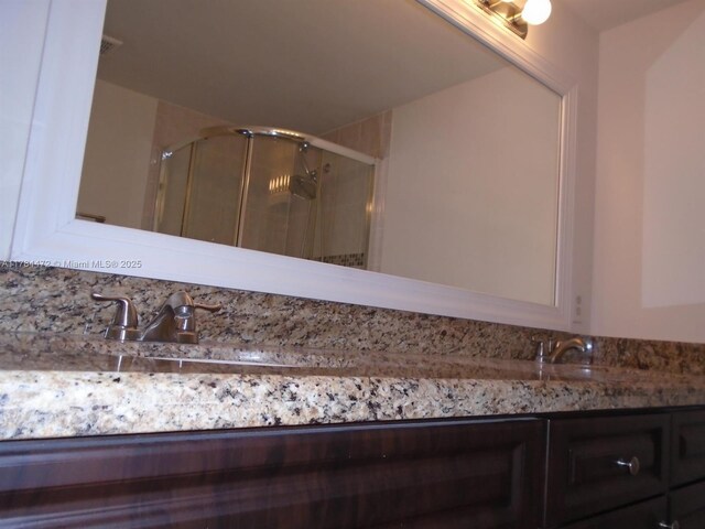 597 Green Springs Pl, West Palm Beach, FL 33409 - bathroom view of a shower stall and vanity