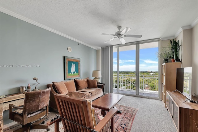 2665 SW 37th Ave Unit 1508, Miami, FL 33133 - carpeted living area with ornamental molding, expansive windows, ceiling fan, and a textured ceiling