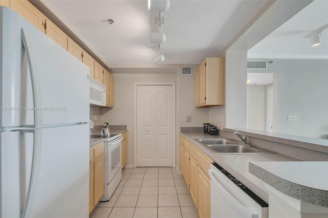 2665 SW 37th Ave Unit 1508, Miami, FL 33133 - kitchen featuring white appliances, a sink, rail lighting, light tile patterned floors, and light brown cabinets