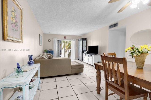 325 NW 72nd Ave Unit 308, Miami, FL 33126 - living room with a textured ceiling, light tile patterned flooring, and ceiling fan